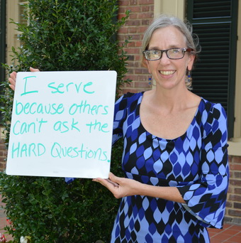 Maureen Berner Holding Why I Serve Sign